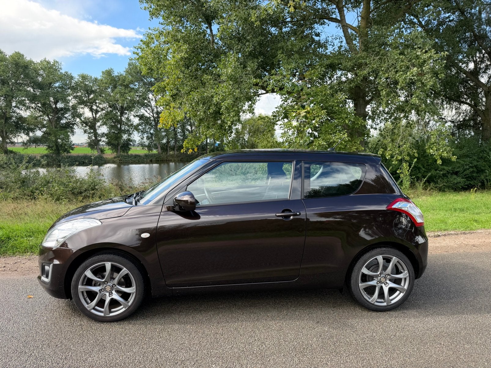 Suzuki Swift 1.2 3D 2015 Bruin, Auto's, Voorwielaandrijving, 4 cilinders, Bruin, Alcantara