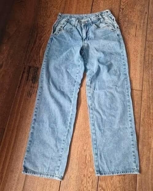 Lichtblauwe jeans met knoopjes - Maat 36, Ophalen of Verzenden