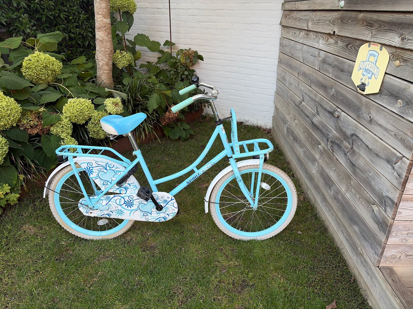 Spirit kinderfiets 22 inch - Lichtblauw met voordrager, Ophalen, Gebruikt, Terugtraprem, 20 inch of meer