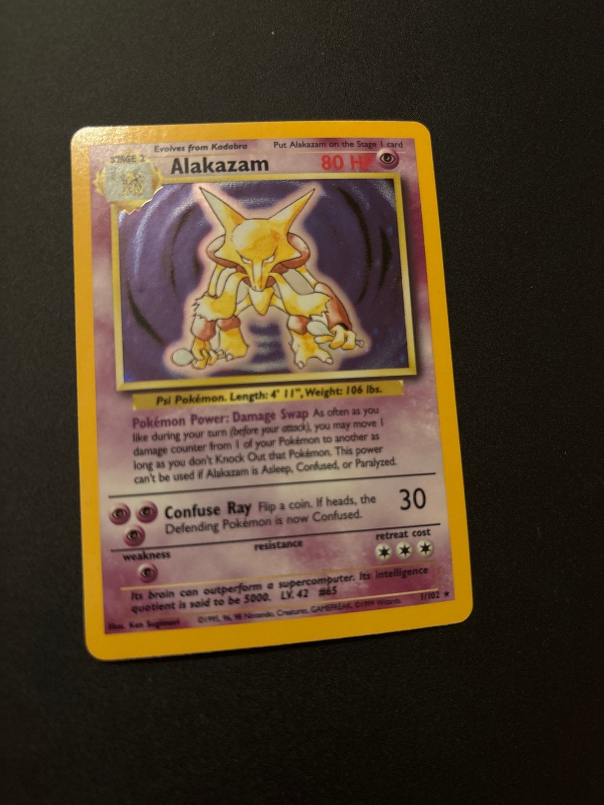 Alakazam 1/102 Base Set Pokémon Kaart - Goede Staat, Ophalen of Verzenden, Gebruikt, Losse kaart