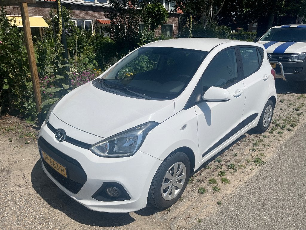 Hyundai i10 1.0i 66pk 2016 Wit - Perfecte staat, 52500km, Auto's, Hyundai, Voorwielaandrijving, Stof, 4 stoelen, Origineel Nederlands
