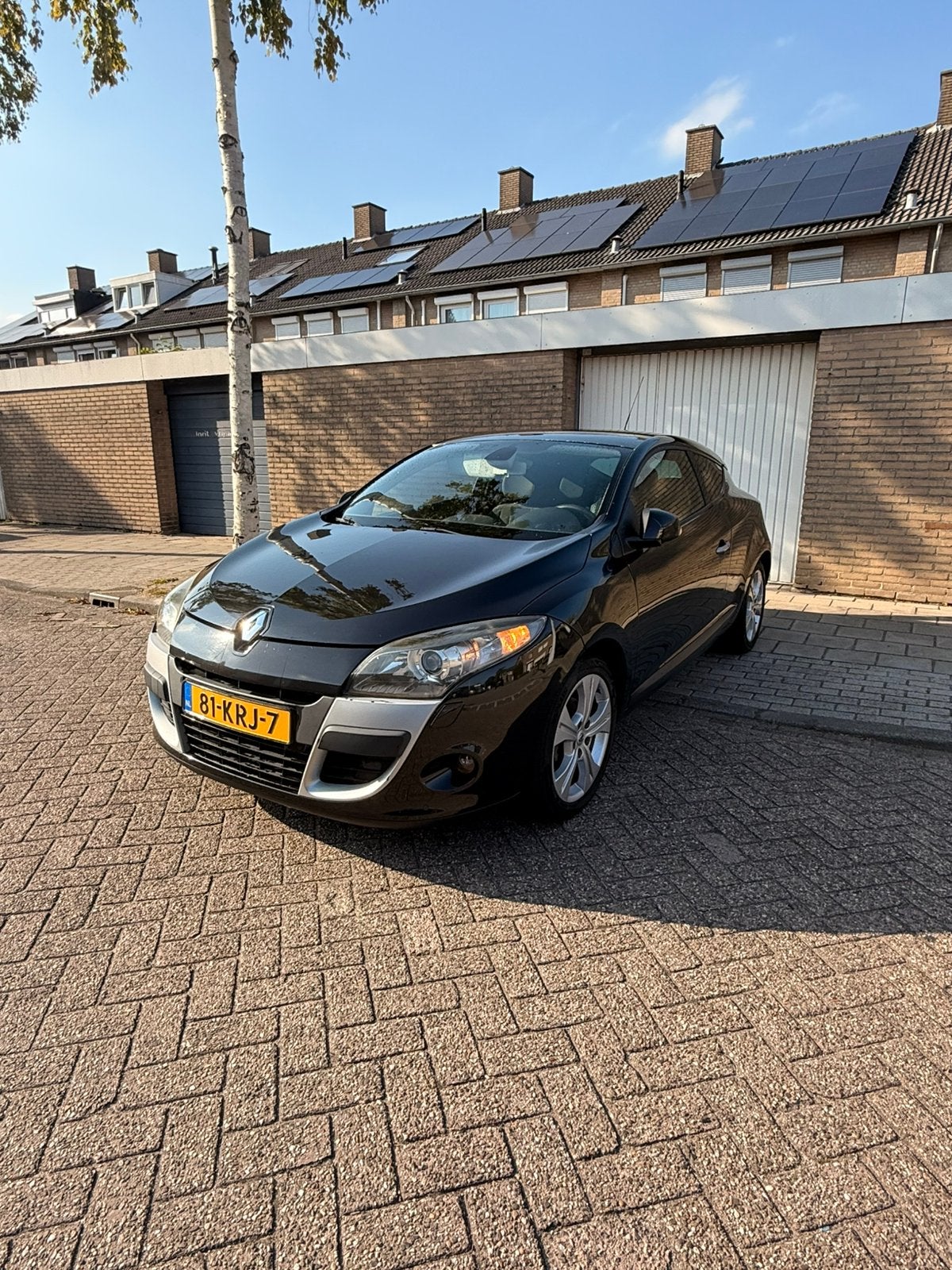 Renault Mégane 1.6 16V 81KW Coupe 2009 Zwart, Auto's, Voorwielaandrijving, 4 cilinders, Zwart, 14 km/l