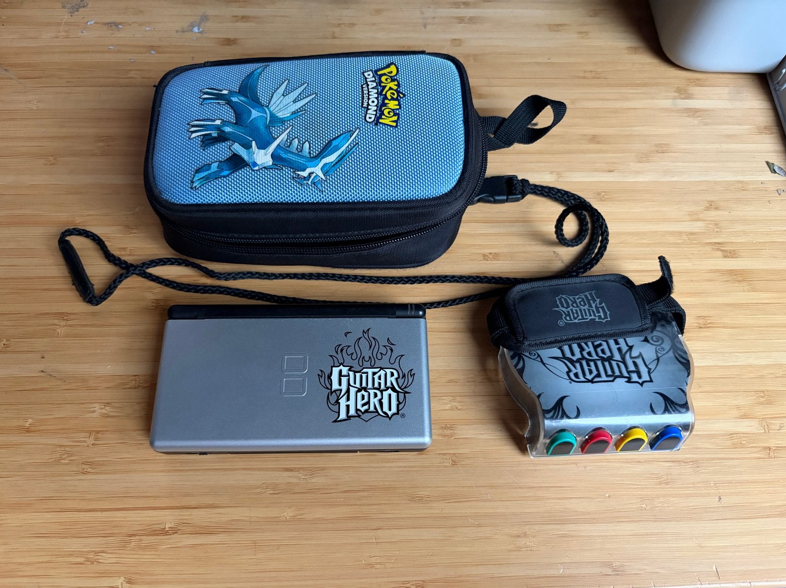 Nintendo DS Lite Rood + Guitar Hero Editie - Retro Gaming, Ophalen of Verzenden, Rood, DS Lite, Gebruikt