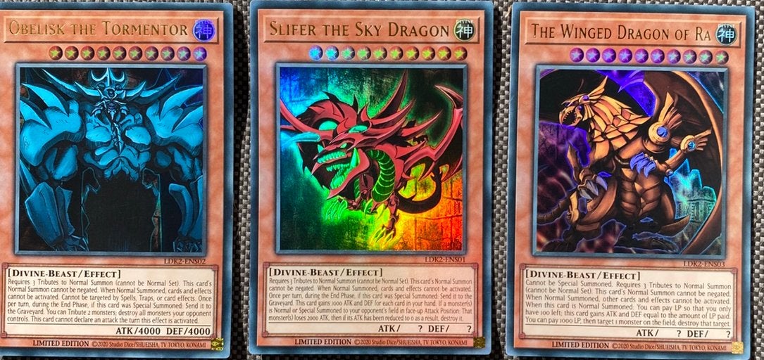 Yu-Gi-Oh! Legendary Egyptian God Card Set Mint -Near Mint !, Ophalen of Verzenden, Zo goed als nieuw, Meerdere kaarten, Foil