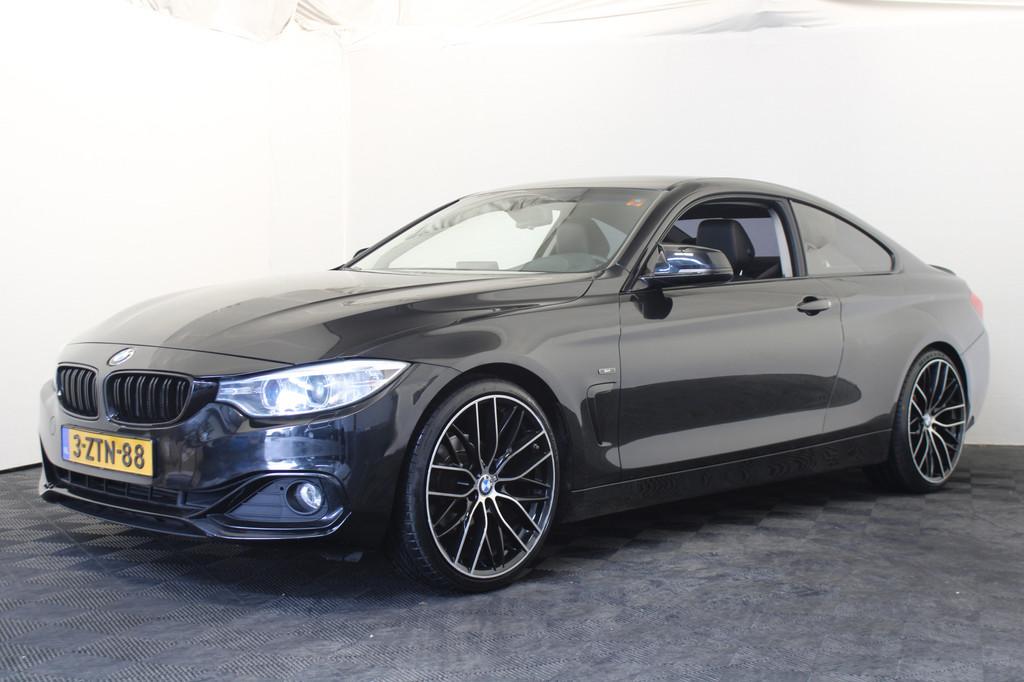 BMW 4 Serie Coupé 420i High Executive (bj 2015), Auto's, BMW, Achterwielaandrijving, Gebruikt, 4 stoelen, Zwart