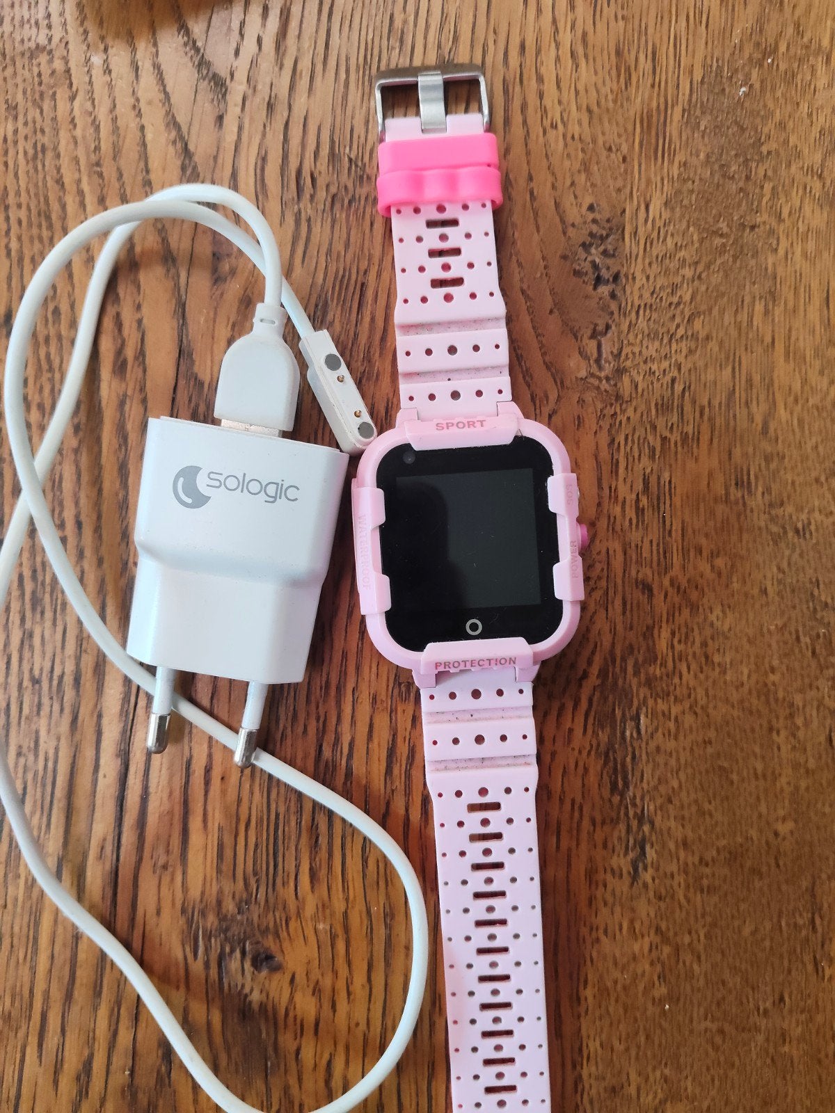 Roze smartwatch voor kinderen met oplader, Gebruikt, Onbekend, Ophalen of Verzenden, Roze