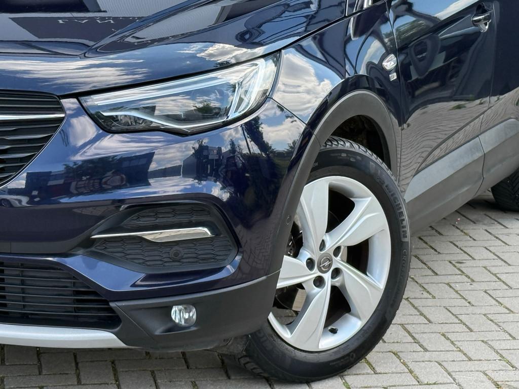 Opel Grandland X 1.2 Turbo 120 Jaar Edition / AUTOMAAT / CAM, Auto's, Opel, Gebruikt, Euro 6, 1199 cc, Blauw