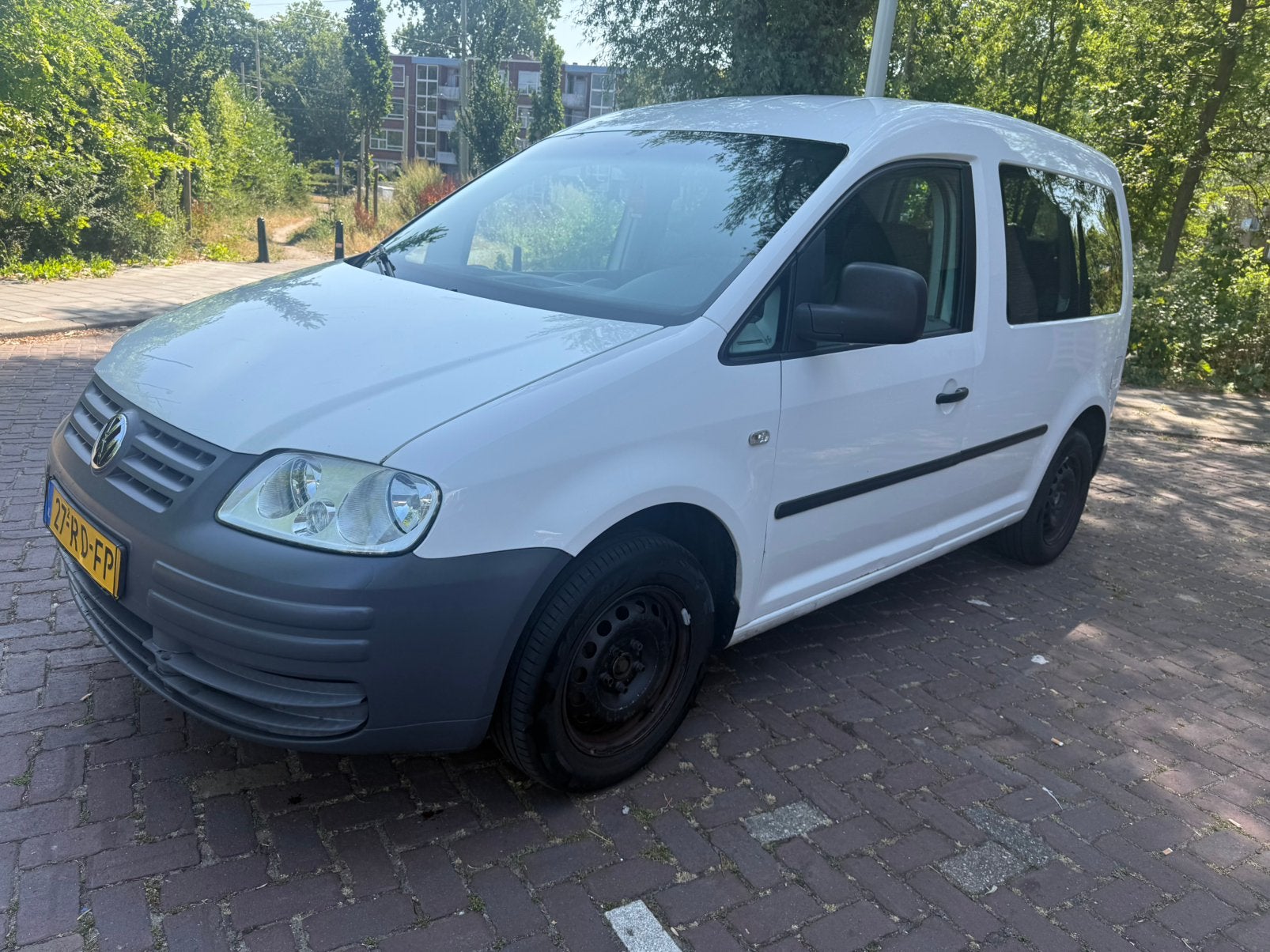 Volkswagen Caddy 7 pers 1.4 55KW Combi 2005 Wit, Auto's, Bestelauto's, Voorwielaandrijving, 74 pk, 4 cilinders, 700 kg