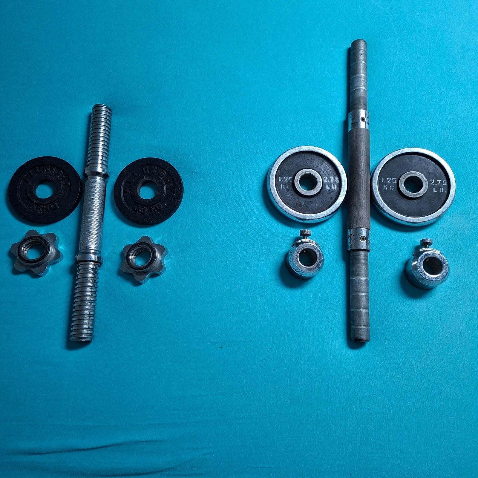 2 verschillende dumbell halters met enkele gewichten., Ophalen of Verzenden, Gebruikt