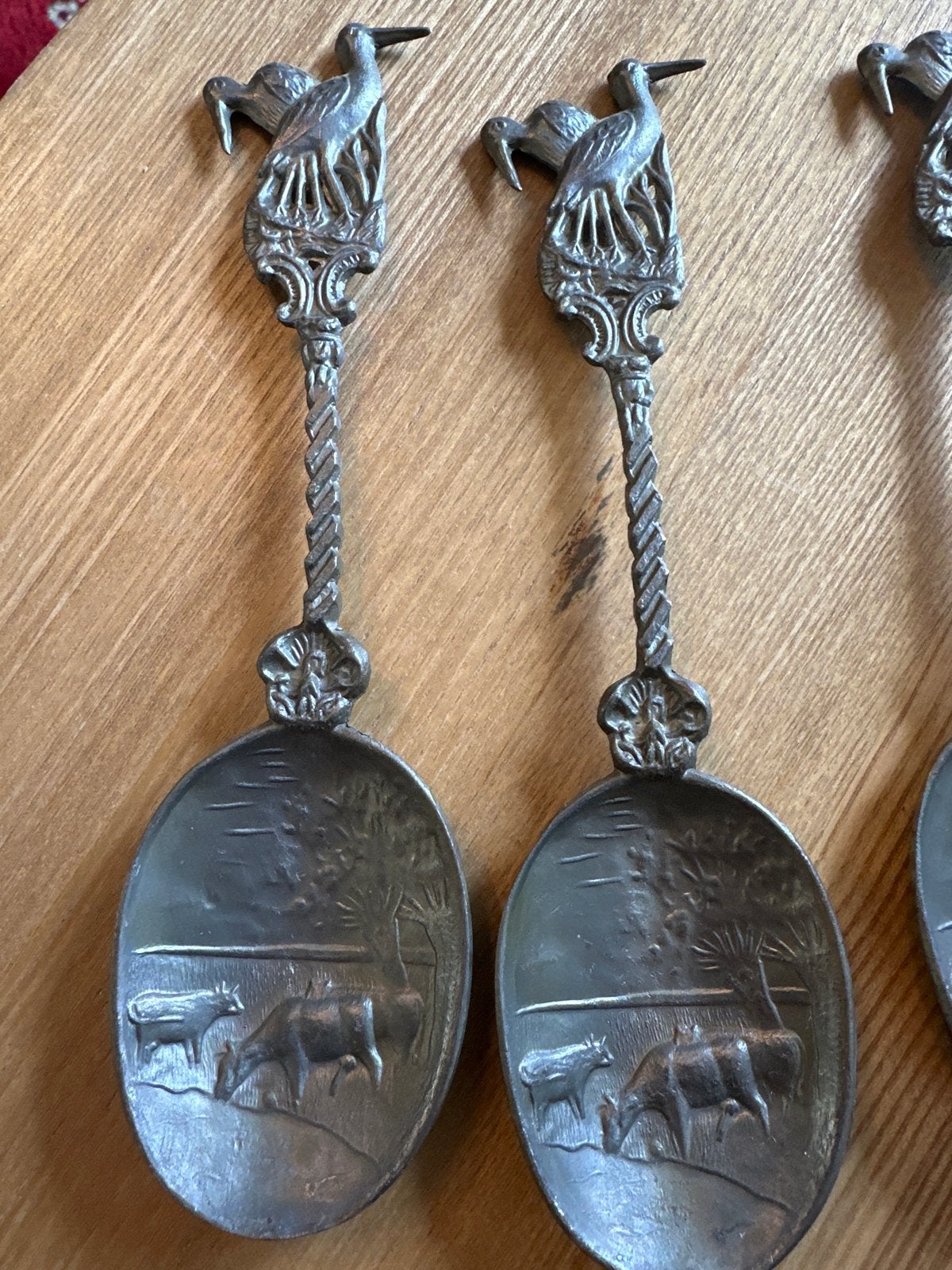 Set van 5 antieke tinnen lepels met ooievaar en koeien, Ophalen of Verzenden