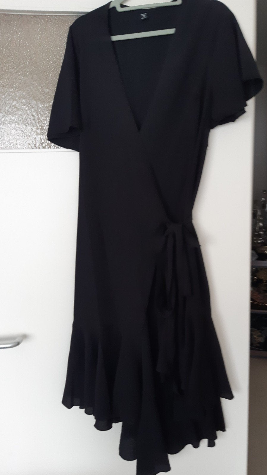 wikkel jurk, Kleding | Dames, Jurken, Ophalen of Verzenden, Maat 42/44 (L), Zwart, Onder de knie