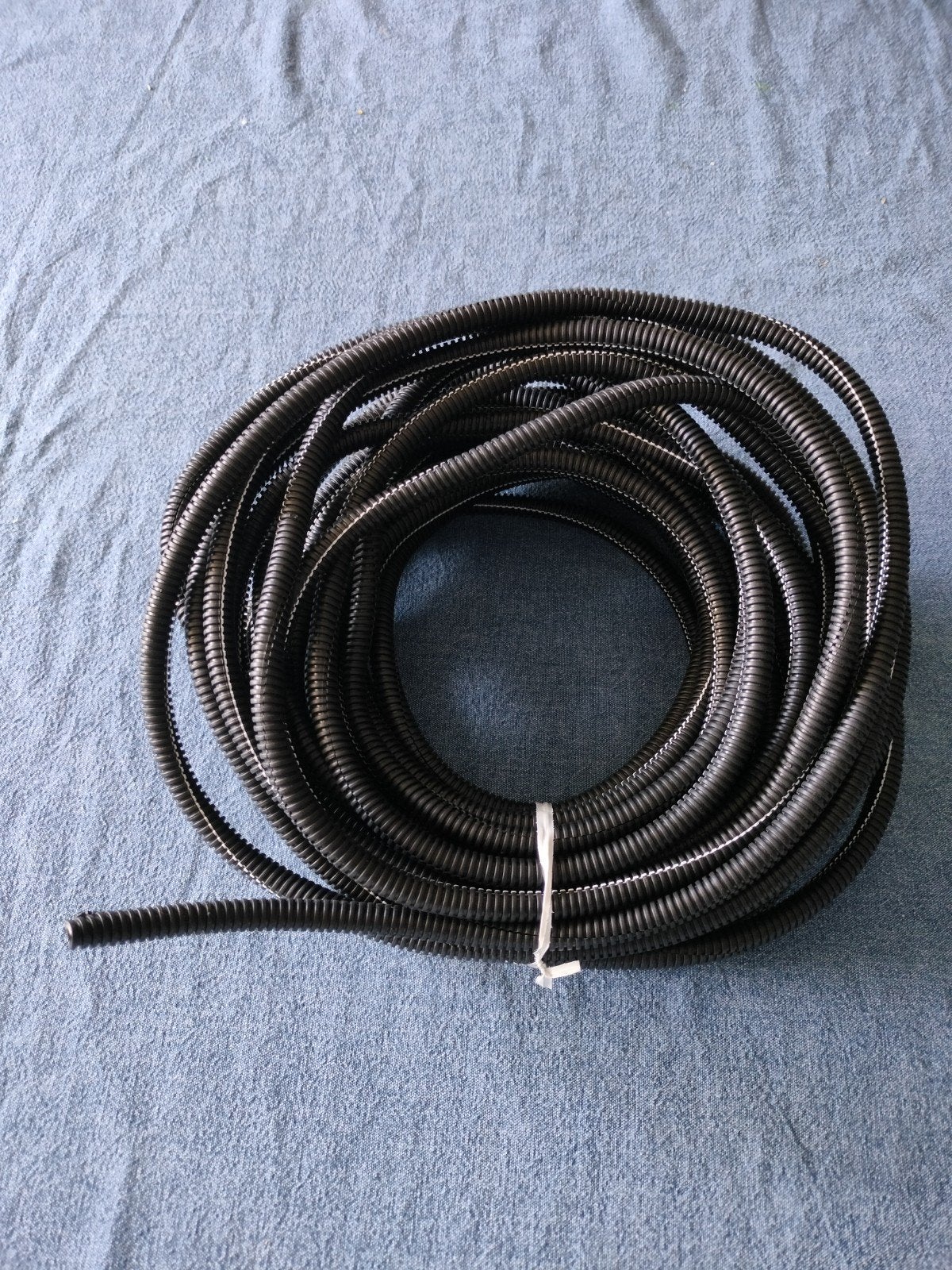 Ribbelbuis 14 meter met split in de lengte, Ophalen of Verzenden, Nieuw, Kabel of Snoer