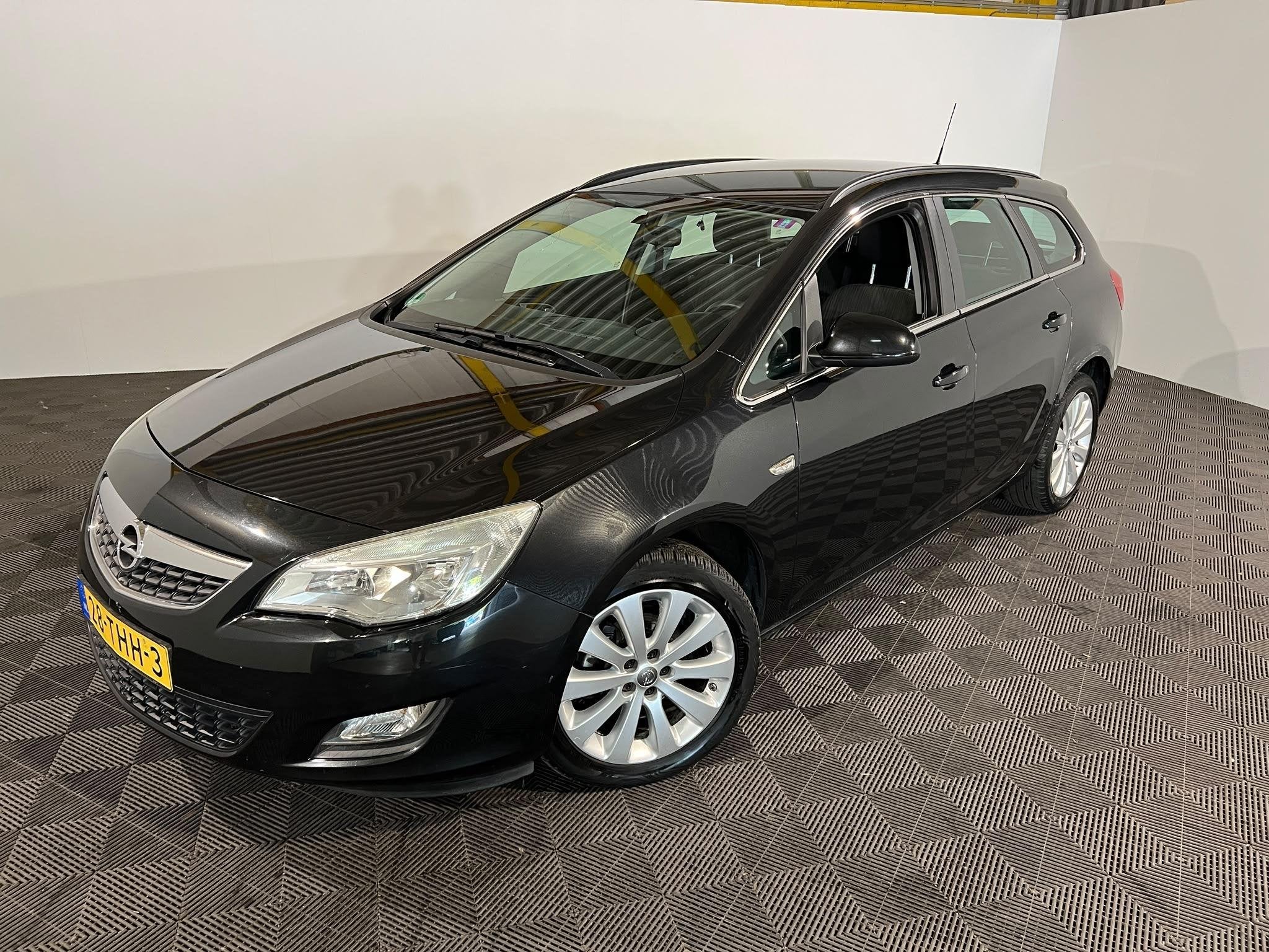 Opel Astra Sports Tourer 1.4 Turbo Edition, Auto's, Voorwielaandrijving, Euro 5, Stof, Gebruikt