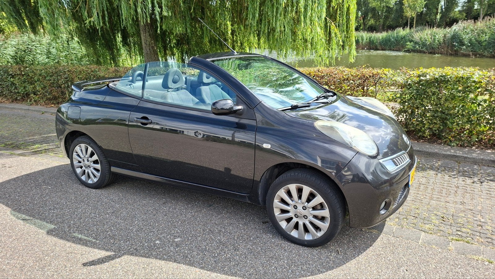 Nissan Micra 1.4 Cabrio 2006 Zwart Karmann, Voorwielaandrijving, 15 km/l, 750 kg, 4 cilinders
