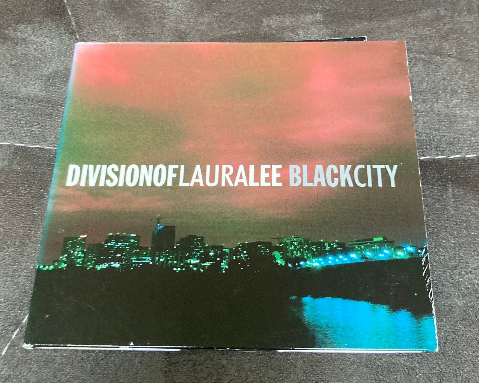 Division of Laura Lee - Black City, Ophalen of Verzenden, Digipak
