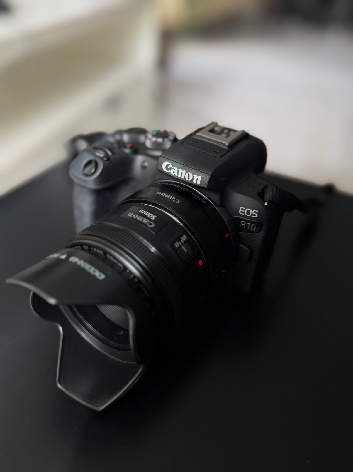 Canon EOS R10 + 50mm + 18-55mm + Adapter | Zo goed als nieuw, Ophalen of Verzenden, Zo goed als nieuw, Lensdop, Systeemcamera
