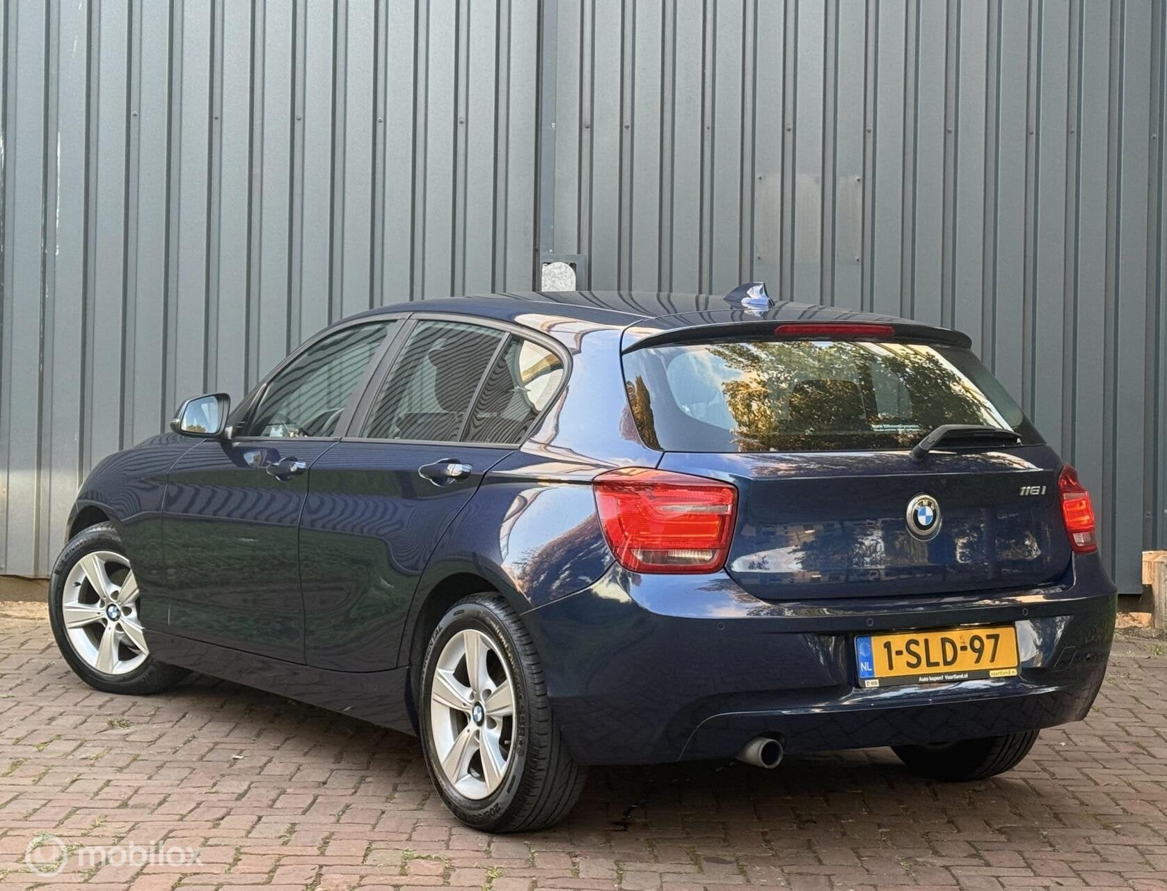 BMW 1-serie 116i EDE Executive |Navi|Clima|Cruise|Xenon|Led, Auto's, Gebruikt, Euro 6, 4 cilinders, Blauw