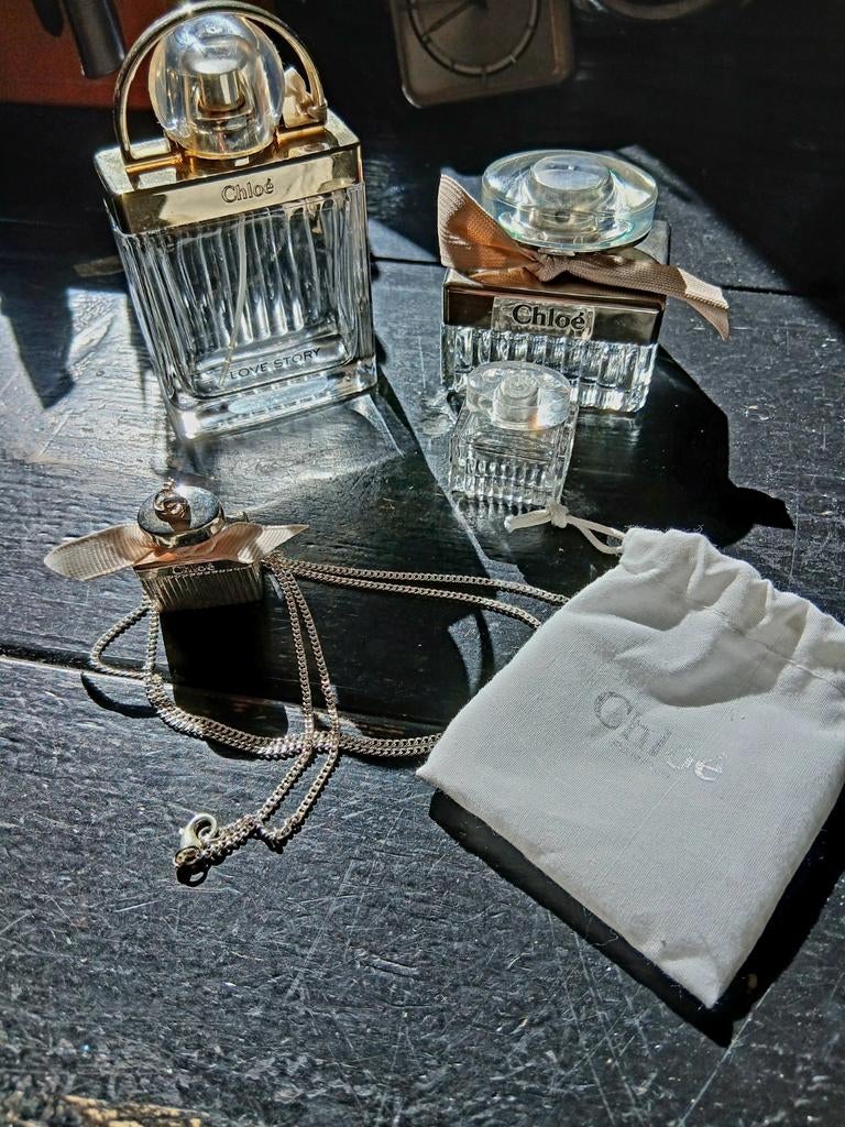 Diverse verzilverde lege CHLOE parfum flesjes en ketting, Ophalen of Verzenden, Gebruikt, Parfumfles