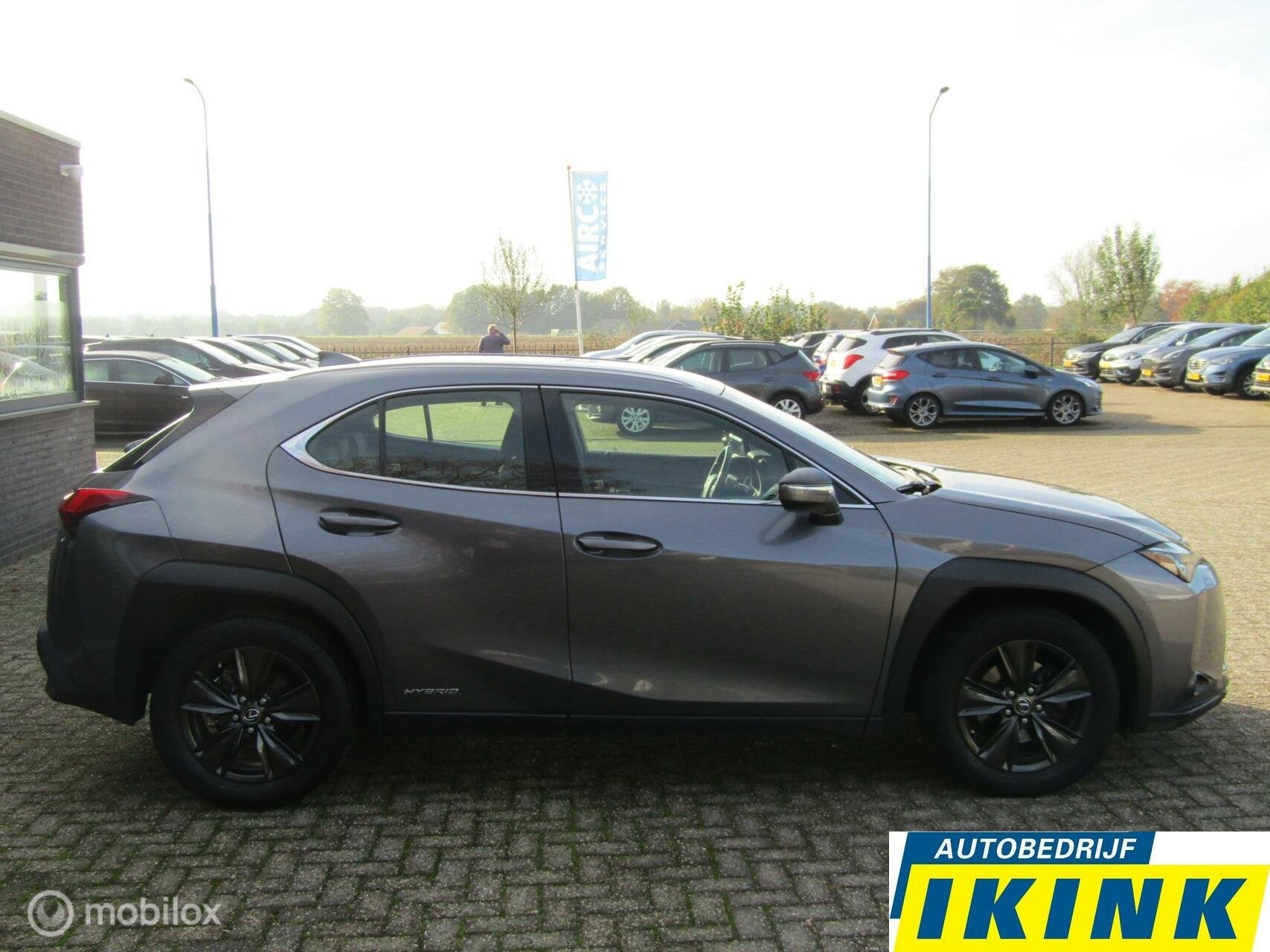 Lexus UX 250h Business Line | Camera, Trekhaak, Auto's, Lexus, Stof, Gebruikt, 4 cilinders, Origineel Nederlands