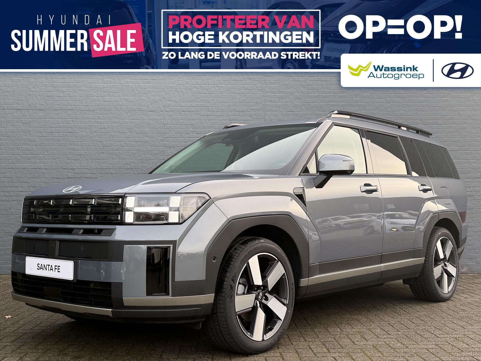 Hyundai Santa Fe New 1.6 T-GDi HEV 215pk Aut 7 zitter Premiu, Auto's, Automatische klimaatregeling, 4 cilinders, Blauw, 7 stoelen