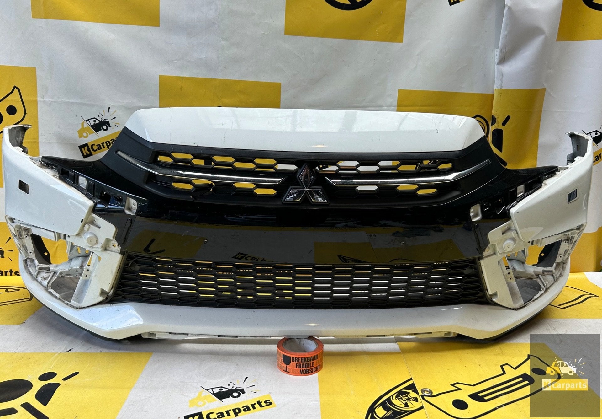 Mitsubishi ASX Outlander Sport voorbumper KLS 6400J025ZZ, Info@fabrikant.eu, Ophalen of Verzenden, Fabrikant BV, Gebruikt