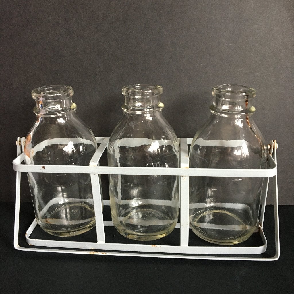 100ml melkfles vaasjes in metaal houder, Ophalen of Verzenden, Zo goed als nieuw, Glas