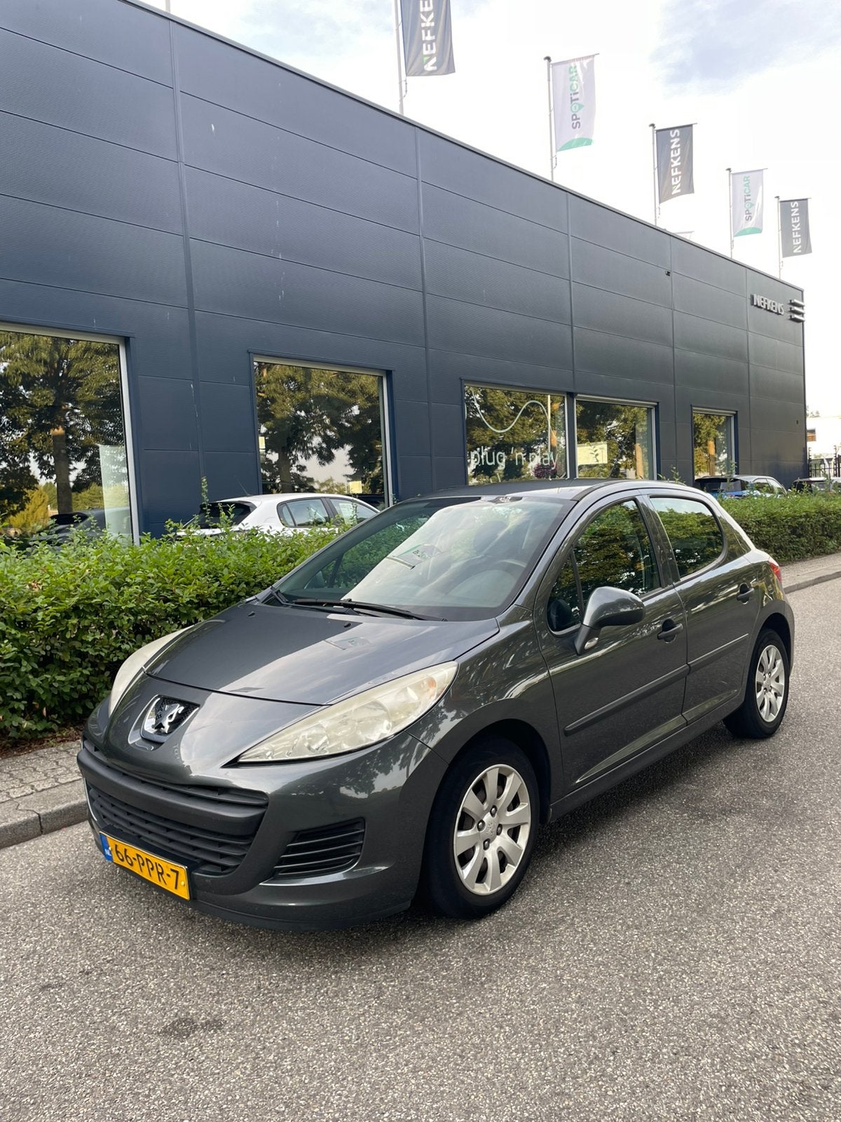 Peugeot 207 1.4 5DRS 2011 Grijs, Auto's, Voorwielaandrijving, Zwart, 4 cilinders, Overige bekleding