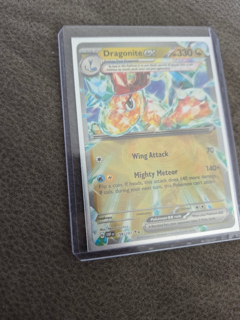 Dragonite ex, Hobby en Vrije tijd, Verzamelkaartspellen | Pokémon, Ophalen of Verzenden, Zo goed als nieuw, Losse kaart, Foil