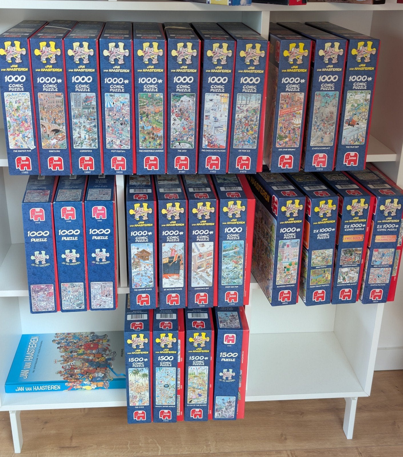 Jan van Haasteren puzzels 26stuks + boek Jan van Haasteren, Ophalen
