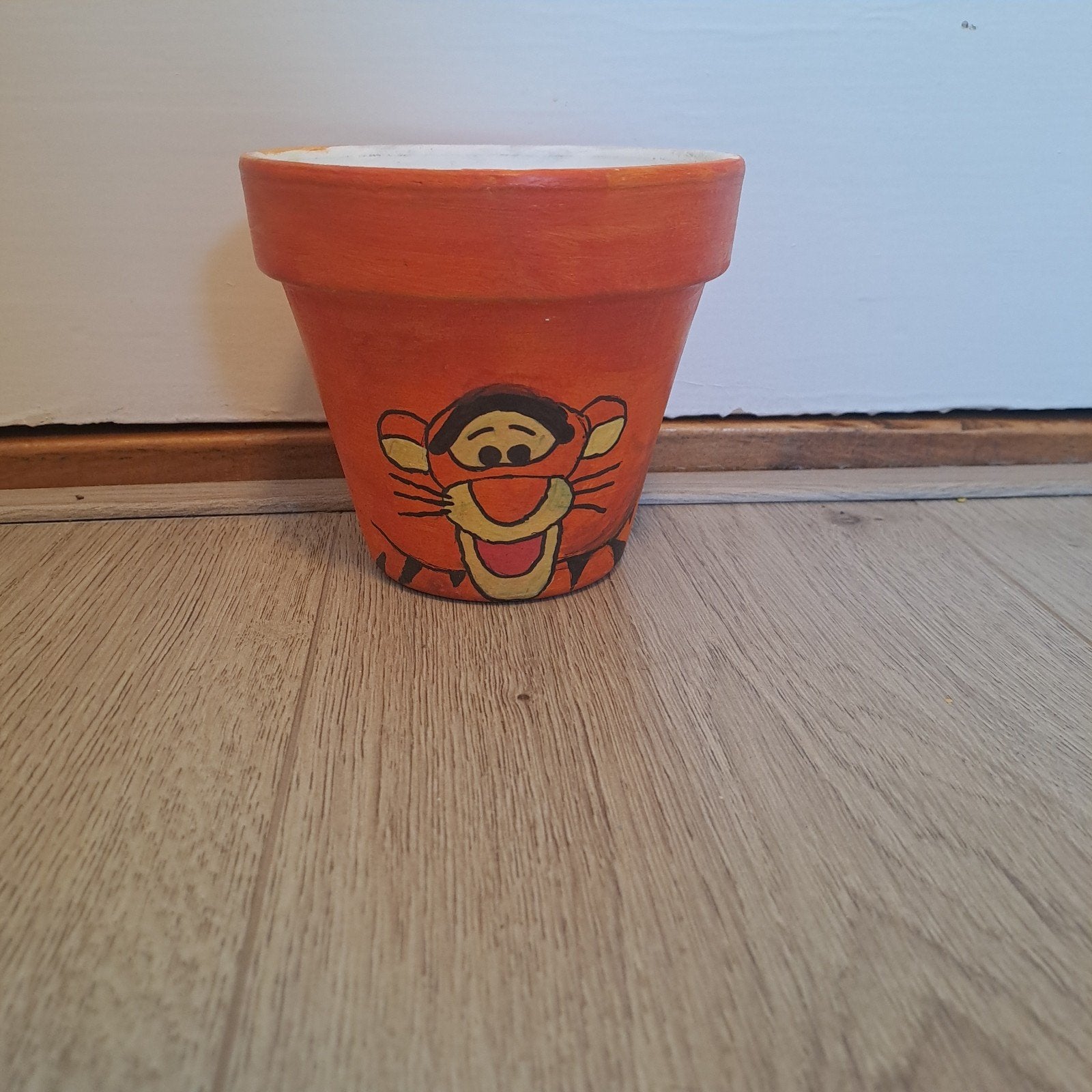 Leuke oranje bloempot met Teigetje, diameter 13 cm, Gebruikt, Oranje, Ophalen of Verzenden, Met patroon/structuur