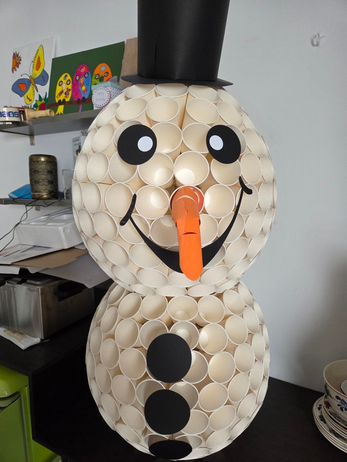 sneeuwpop zelf gemaakt, Ophalen, Versiering