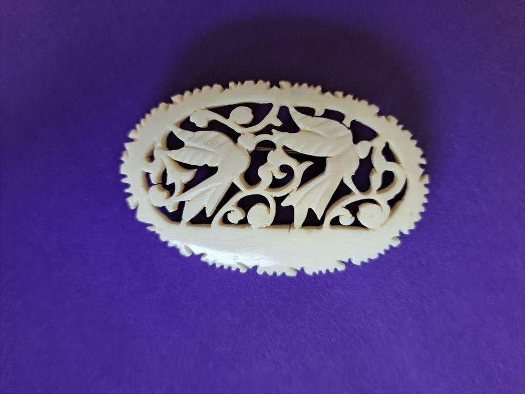 vintage - benen broche - 2 engelen, Ophalen of Verzenden, Gebruikt, 4 tot 7 cm, Overige materialen