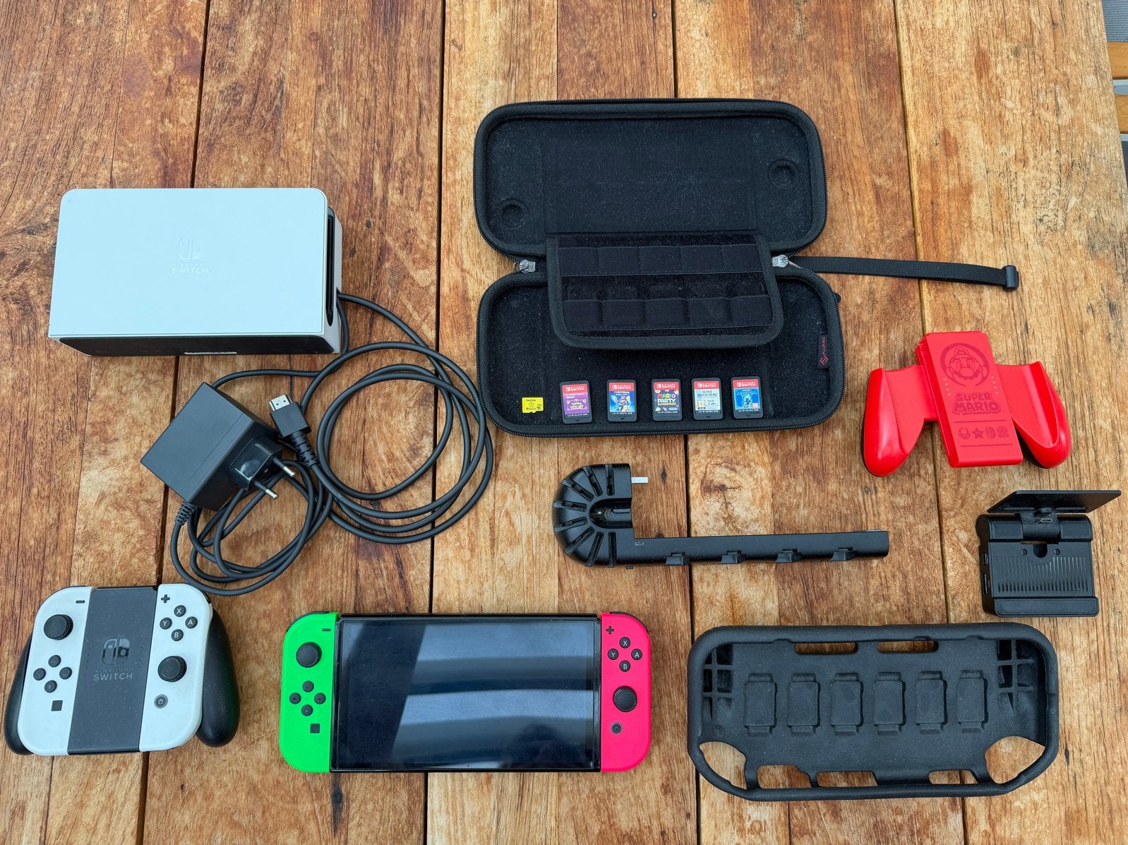 Nintendo Switch OLED compleet met 5 games en accessoires
