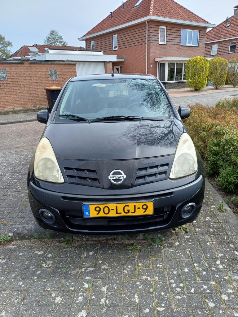 Nissan Pixo 1.0 50KW 5D 2010 Zwart/ goedgekeurd tot mei '27, Auto's, Nissan, Voorwielaandrijving, Stof, Elektrische ramen, 4 stoelen
