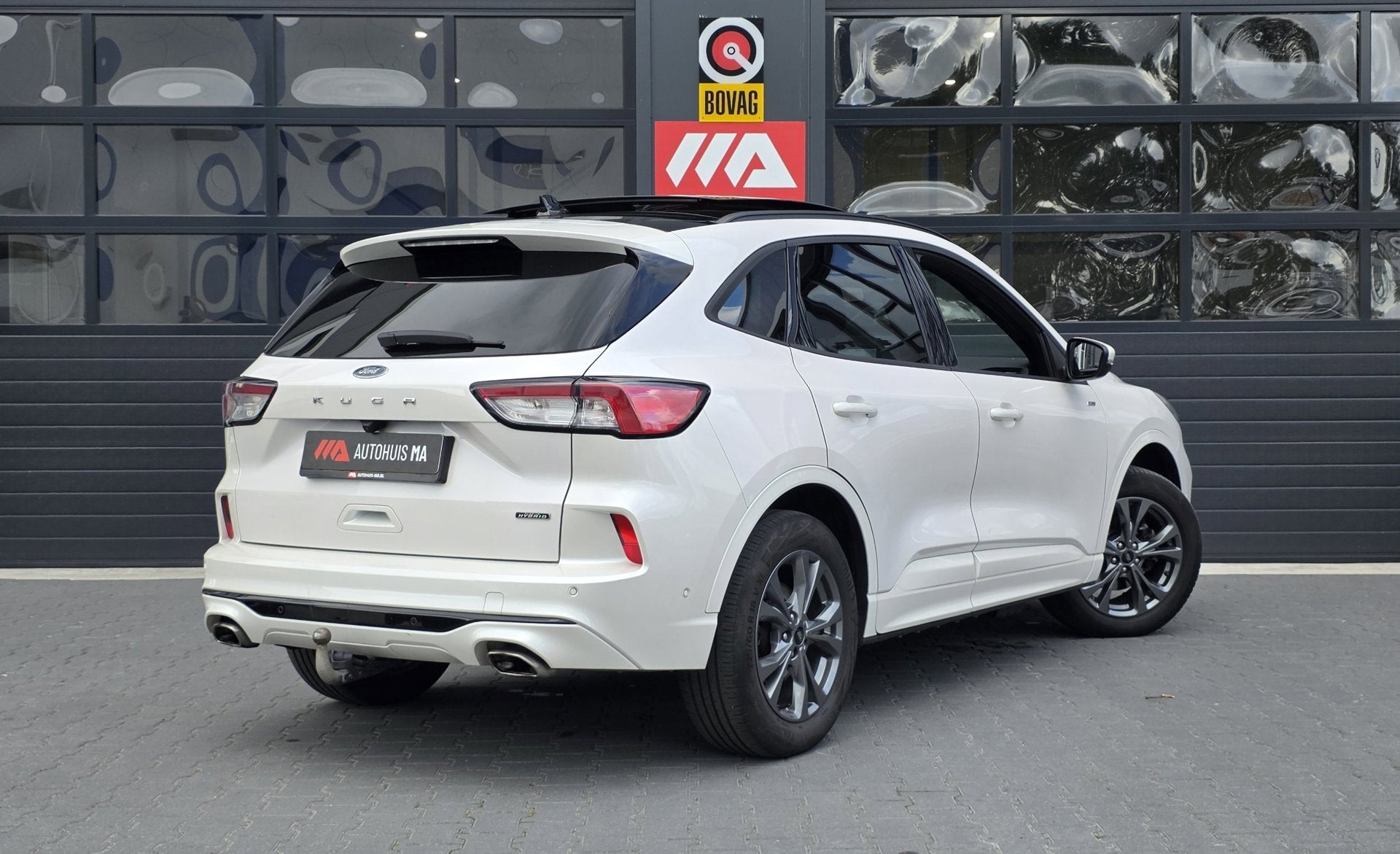 Ford Kuga 2.5 PHEV ST-Line X | PANO | TREKHAAK | ADAPTIVE |, Auto's, 14 kWh, Gebruikt, 4 cilinders, Leder en Stof