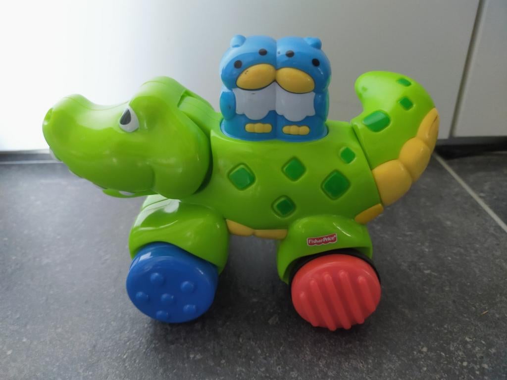 Fisher-Price Amazing Animals Press & Go Krokodil, Kinderen en Baby's, Ophalen of Verzenden, Zo goed als nieuw, Overige typen, Met wieltjes