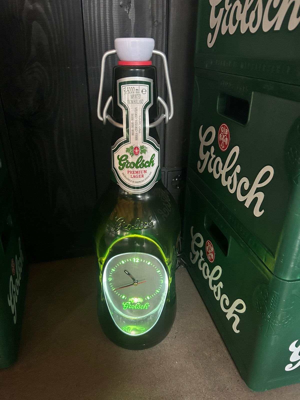 Nieuw in doos grolsch 5l beugelfles klok met verlichting, Ophalen of Verzenden, Zo goed als nieuw, Reclamebord, Plaat of Schild