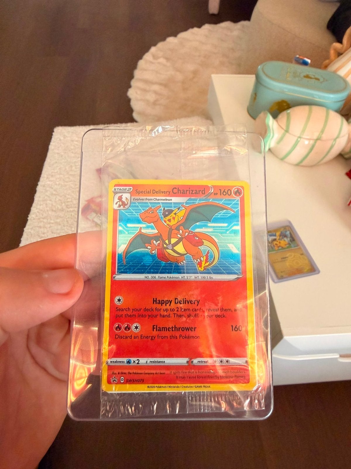 Charizard SWSH075 Special Delivery Sealed Pokémon Kaart, Ophalen of Verzenden, Nieuw, Losse kaart