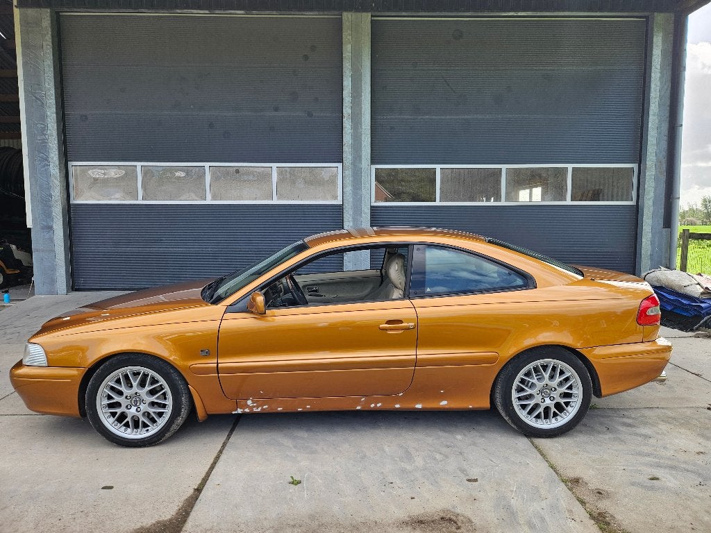 Volvo C70 2.3 T-5 AUT 1998 (Hobby/Project) cosmetisch werk, Auto's, C70, Beige, Overige kleuren, 4 stoelen