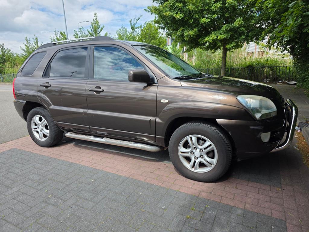 Kia Sportage 2.0 2WD 2006 Bruin, 1442 kg, 4 cilinders, Bruin, Handgeschakeld