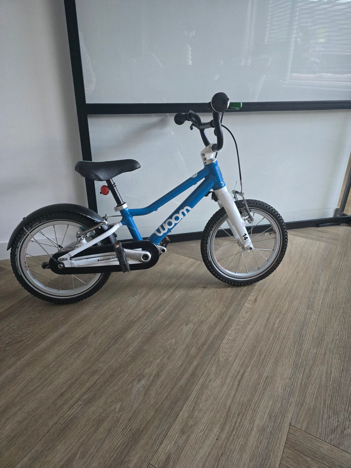 Kinderfiets WOOM, Ophalen of Verzenden, Gebruikt, Minder dan 16 inch, Zijwieltjes