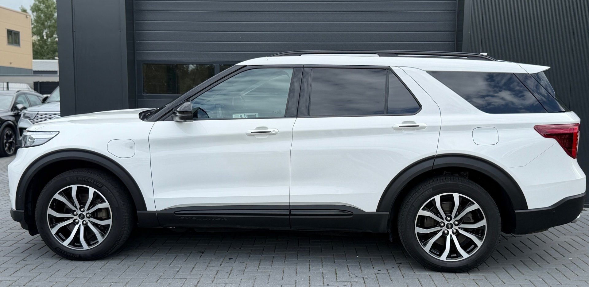 Ford Explorer 3.0 V6 EcoBoost PHEV ST-Line Pano|7P|Leder|360, Auto's, Gebruikt, Zwart, Explorer, Wit