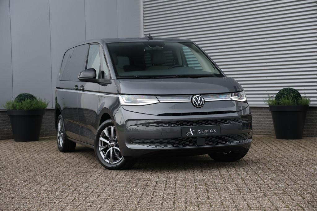 Volkswagen Multivan 1.4 eHybrid L1H1 Style 7P 218PK Elektris, Auto's, Gebruikt, 7 stoelen, Hybride Elektrisch/Benzine, 1600 kg