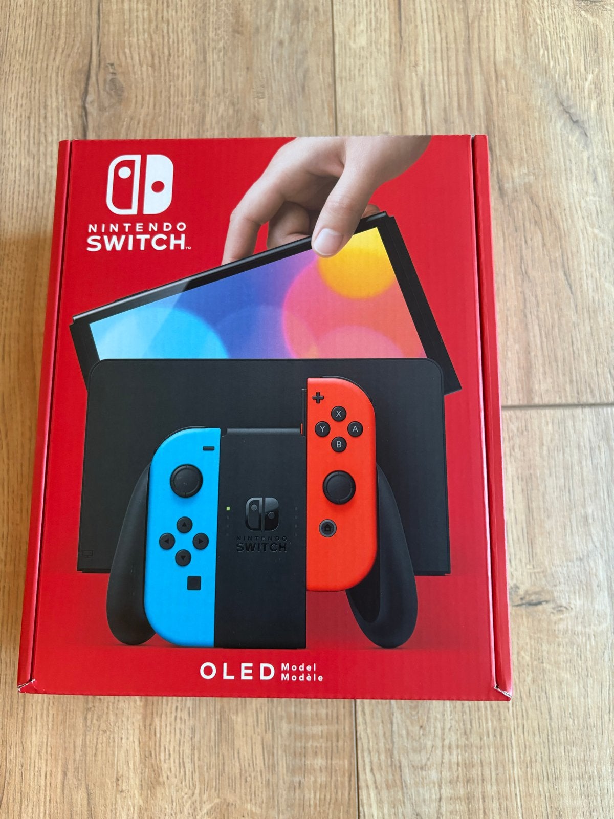Nieuwe Nintendo Switch OLED - Rood/Blauw Joy-Cons, Ophalen of Verzenden, Nieuw, Met 2 controllers, Switch OLED