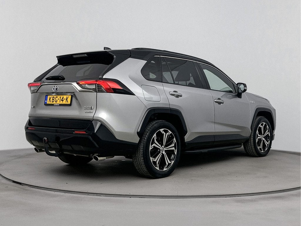 Toyota RAV4 2.5 Plug-in Hybrid AWD Bi-Tone Plus | Panoramada, Auto's, Toyota, Automaat, 12 maanden, Gebruikt, 4 cilinders