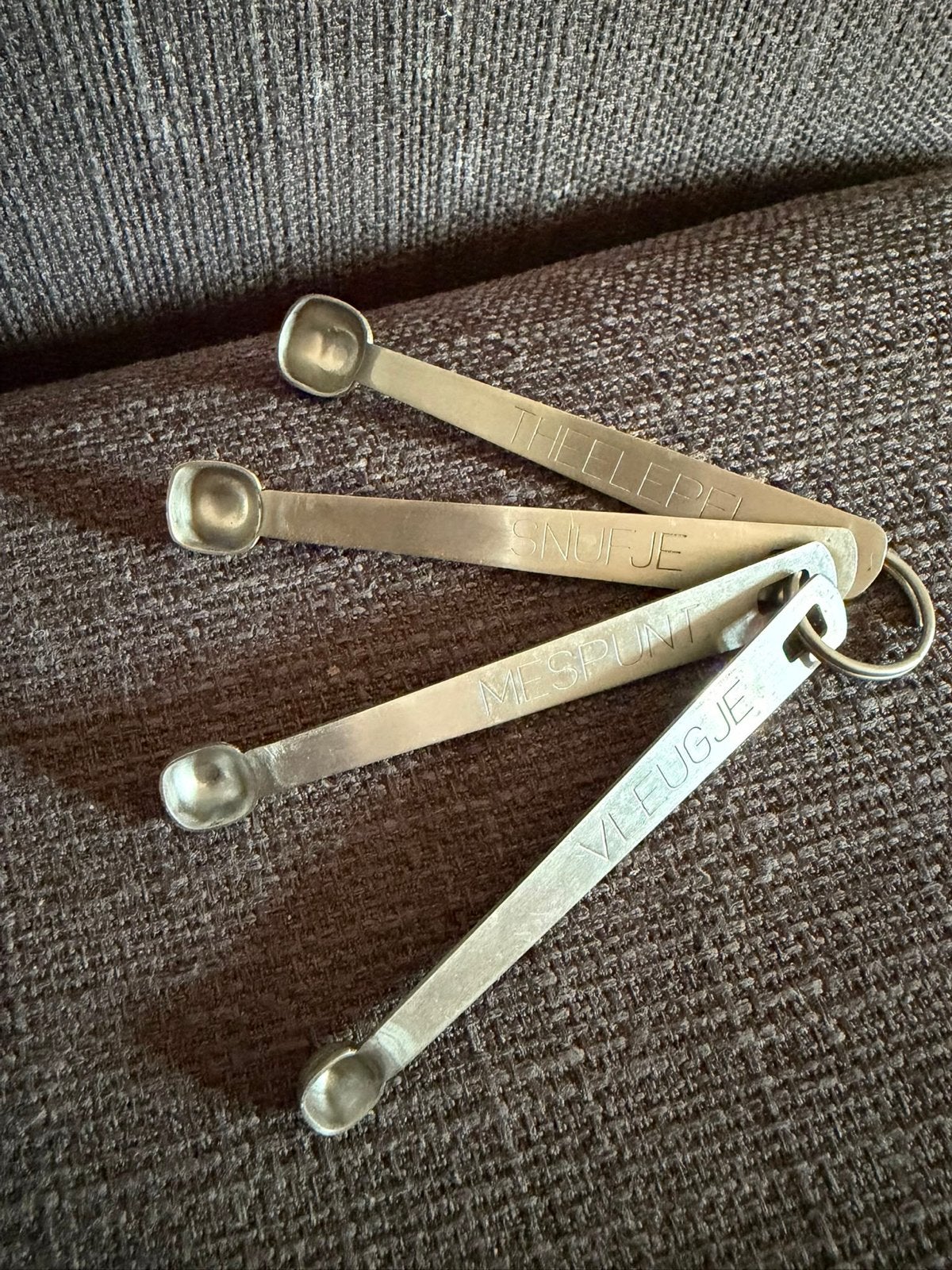 Bijzondere vintage maatlepelset met 4 kleine lepels., Zilver, Ophalen of Verzenden, Metaal, Overige merken