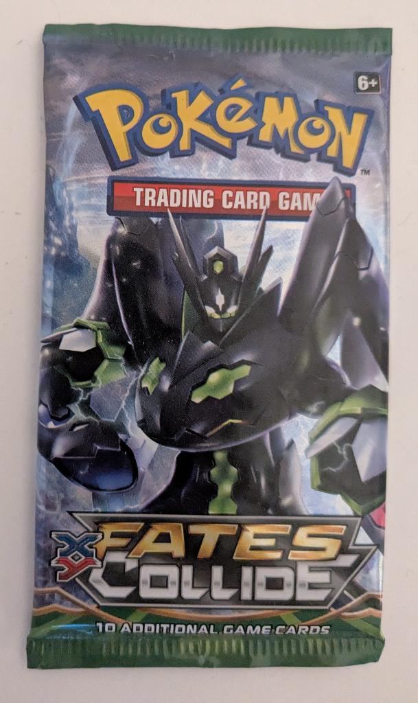 10 jaar oude Fates Collide booster pack | Pokémon TCG, Verzenden, Zo goed als nieuw, Booster