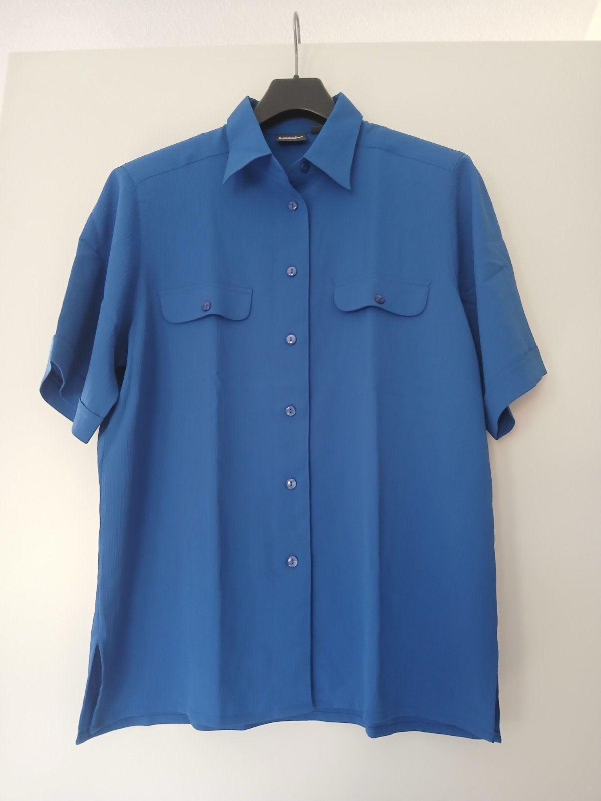 Blauwe vintage blouse in maat 42., Ophalen, Blauw, Maat 42/44 (L), Zo goed als nieuw