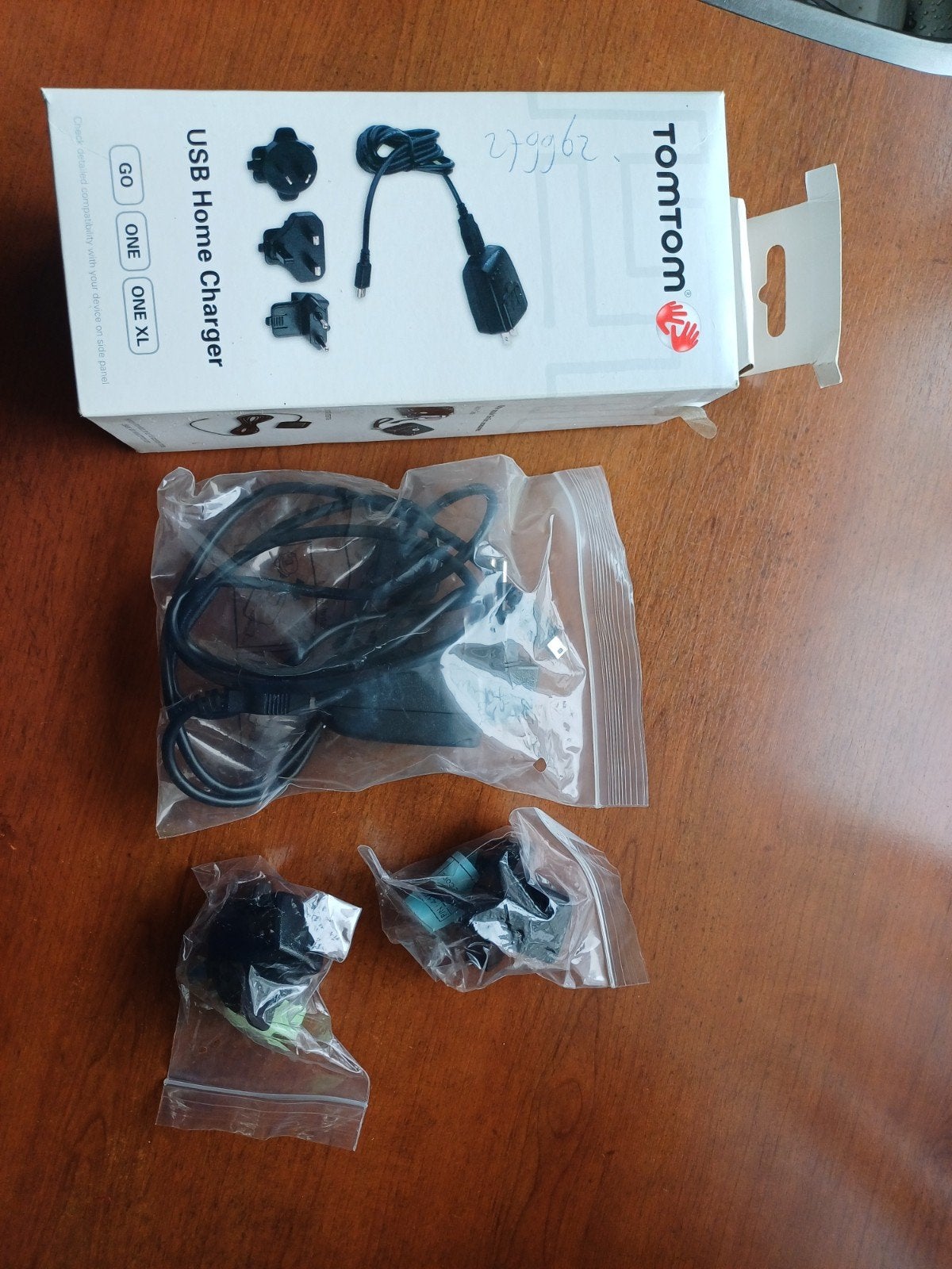 Nieuwe TomTom thuislader en beschermhoes, Ophalen, Nieuw