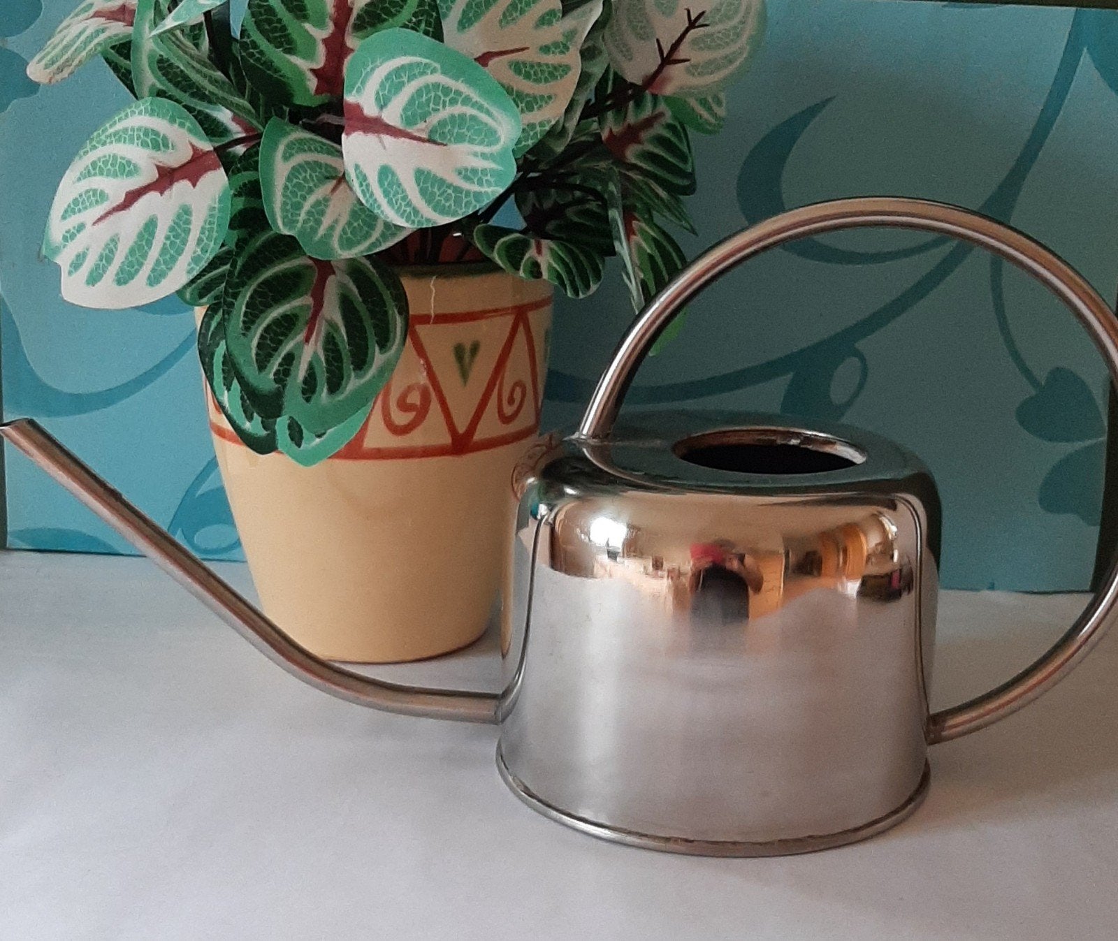 Fraaie design gieter,rvs, Huis en Inrichting, Woonaccessoires | Onderzetters, Ophalen of Verzenden